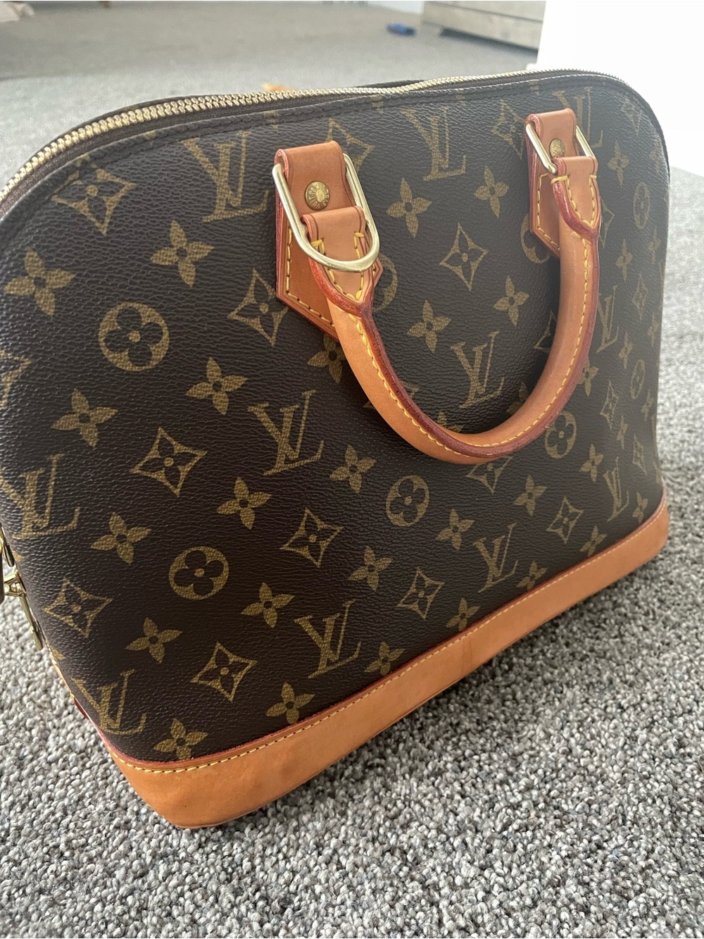Authentic Louis Vuitton Monogram Alma Satchel in Brown with Tan Trim